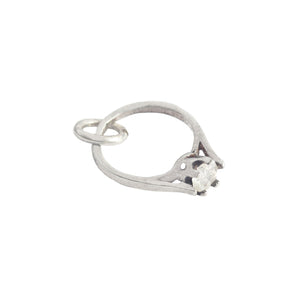 Silver ring with a stone on a white background