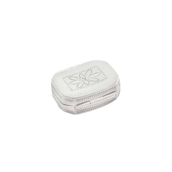 White vinaigrette with floral design on a white background