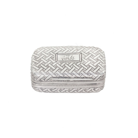 Silver woven jewellery vinaigrette on a white background