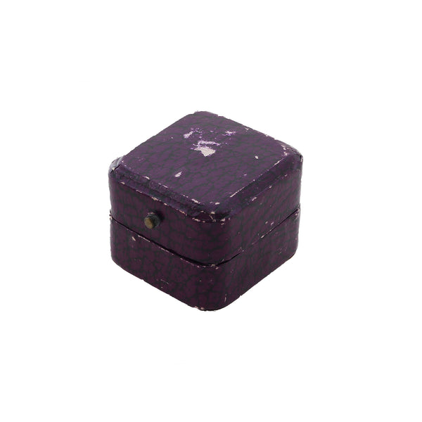 Small purple wooden box on a white background