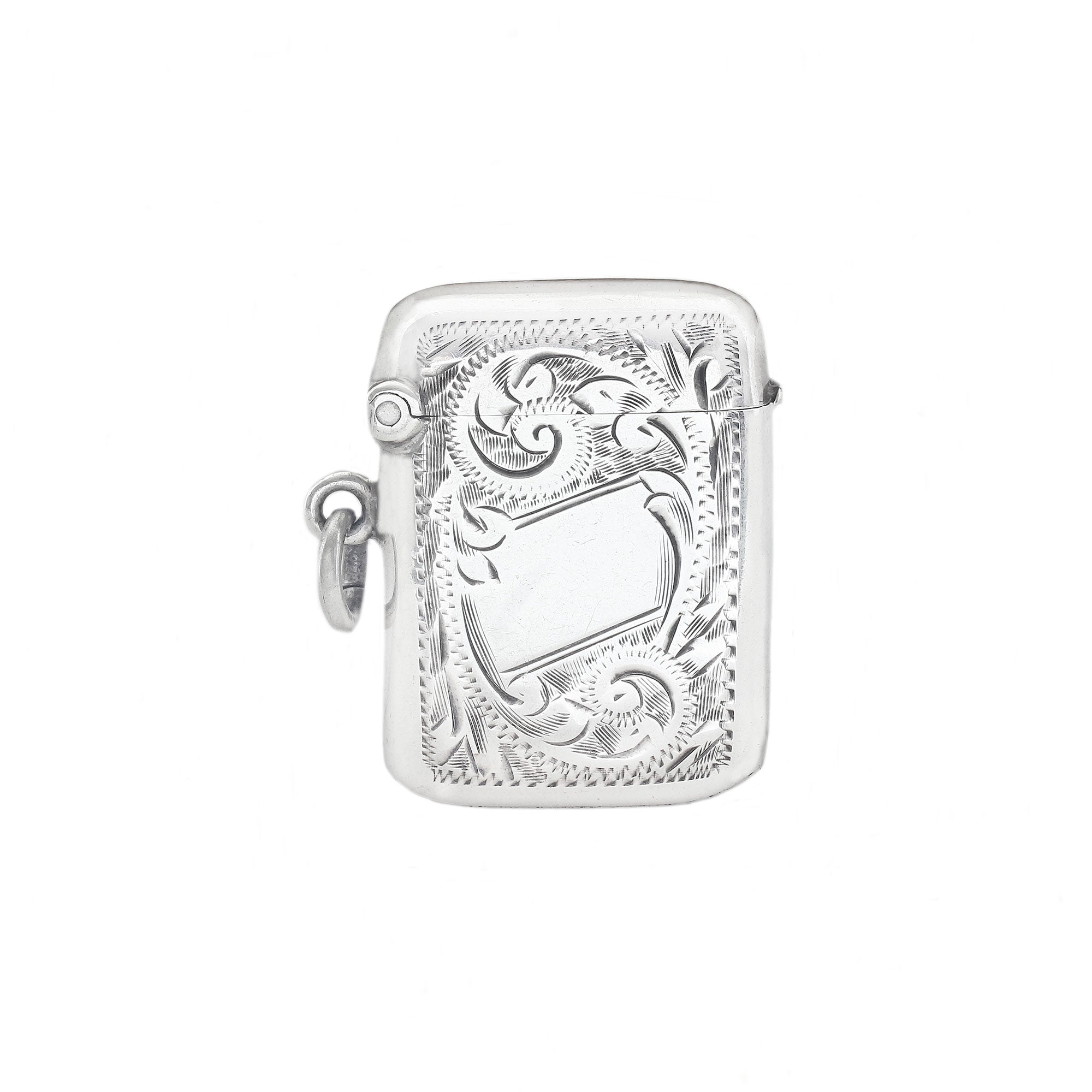 Silver engraved vesta on a white background