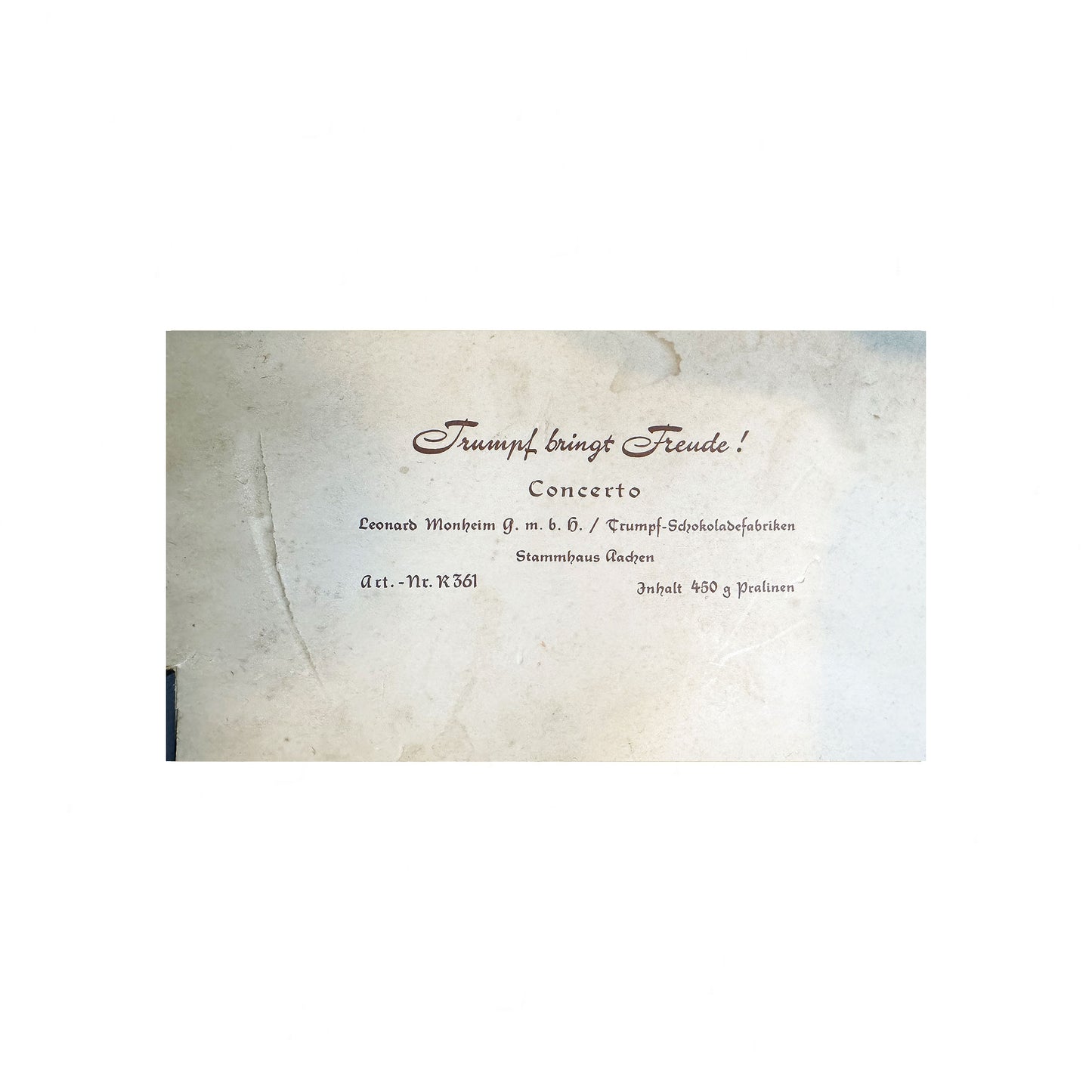 Vintage-style business card with text on a textured background