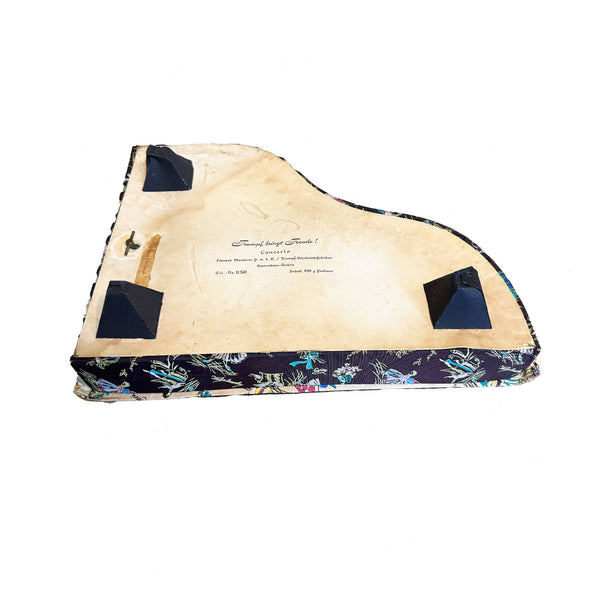 Floral-patterned fabric with a label on a white background