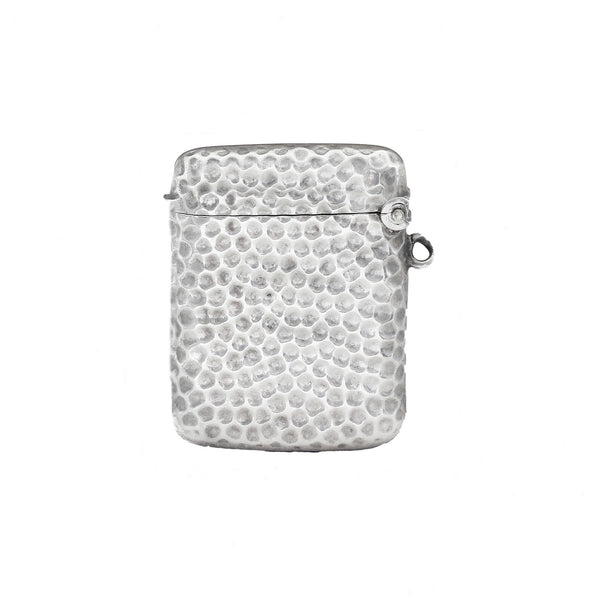 Textured hammered design vesta on a white background