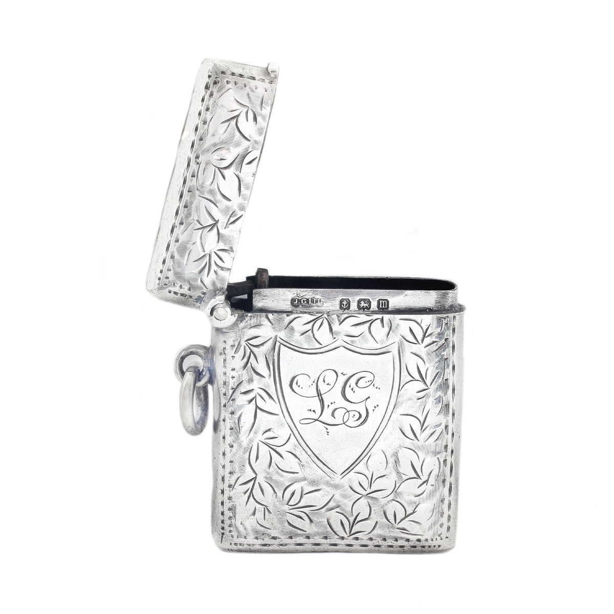Decorative vesta with floral patterns and a central emblem on a white background