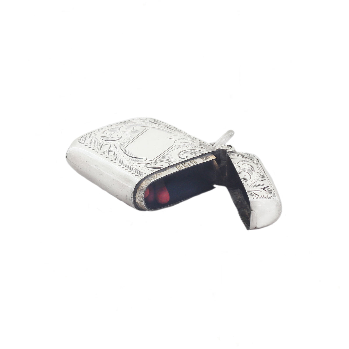 Silver vesta case with engraved design on a white background