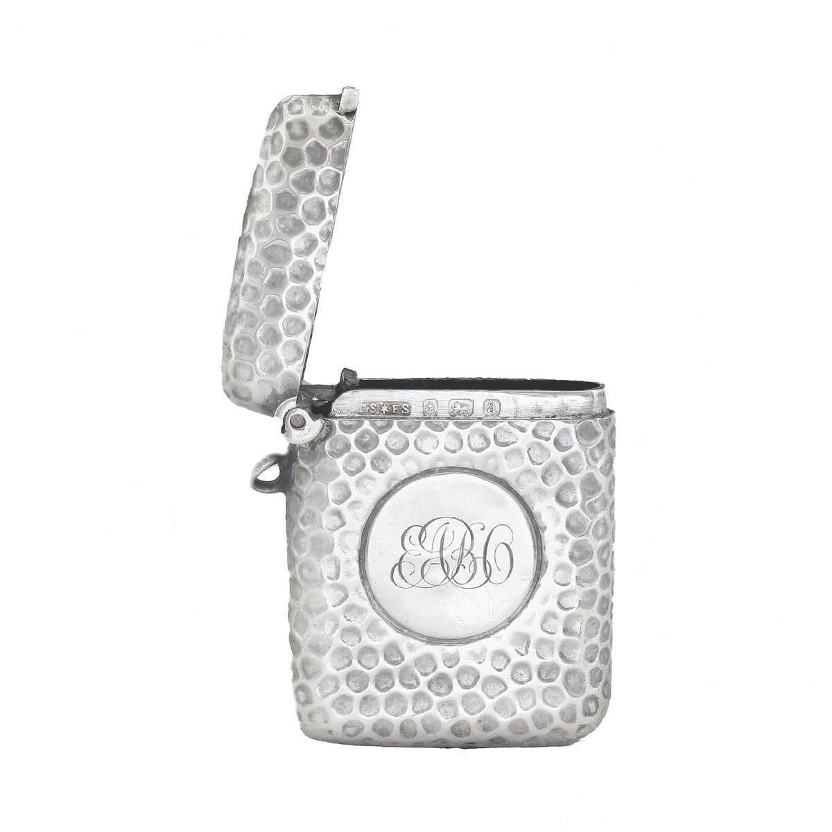 Silver textured vesta with monogram on a white background