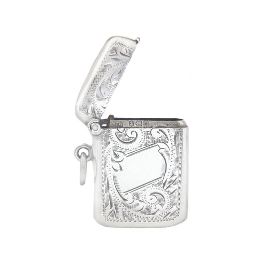 Decorative silver vesta case on a white background