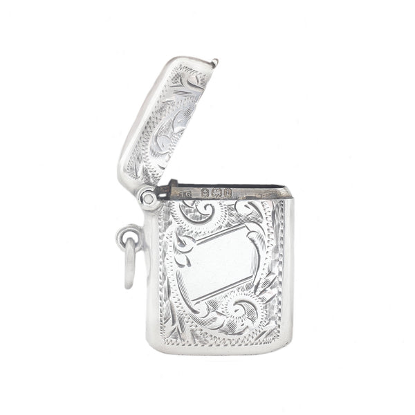 Decorative silver vesta case on a white background
