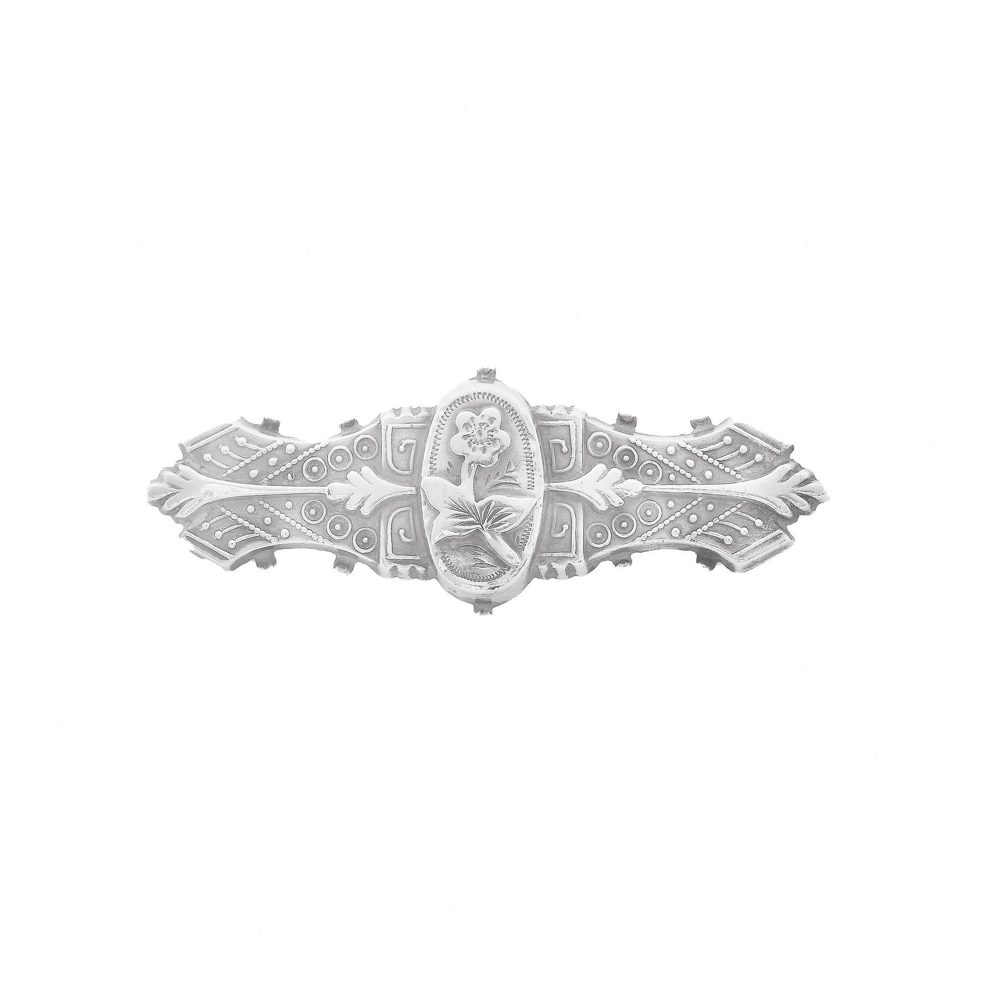 flower engraved silver brooch