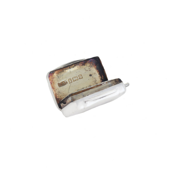 antique vinaigrette with a rusty surface on a white background