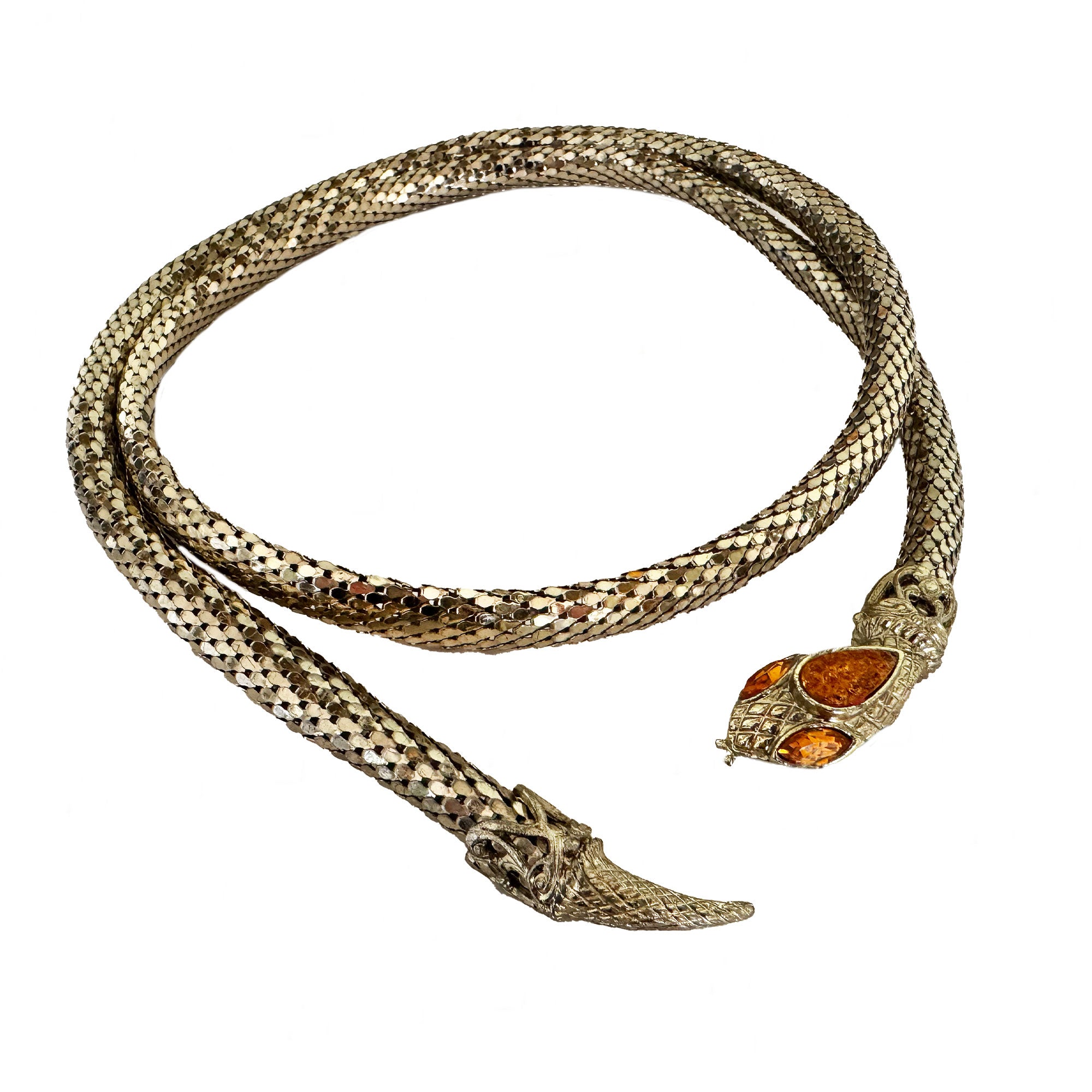 Snake-shaped bracelet with amber tone eyes on a white background