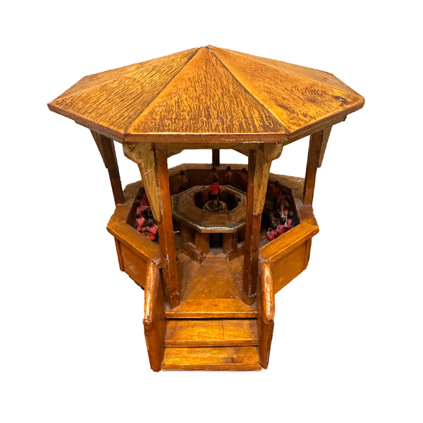 Wooden octagonal bandstand with steps on a white background