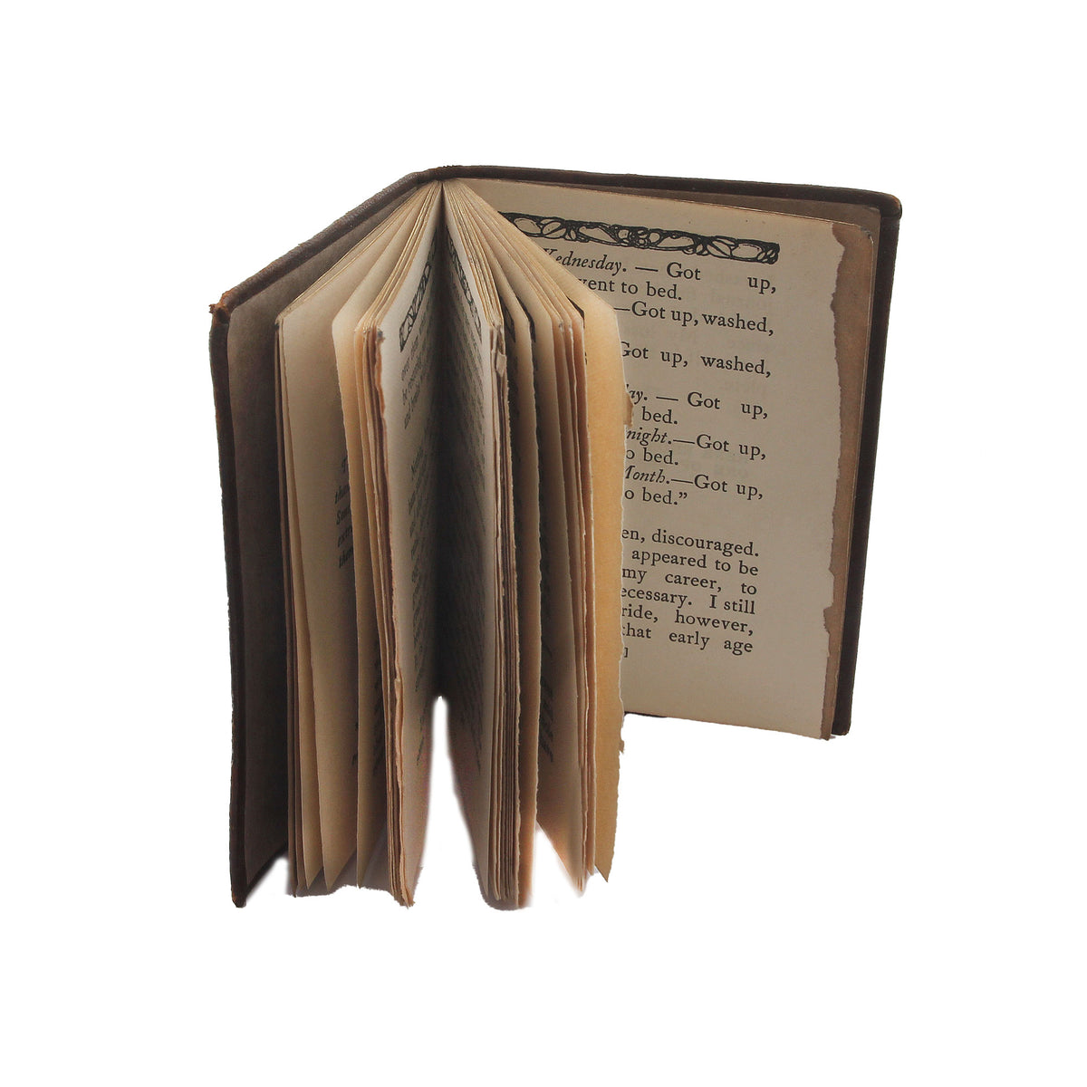 A vintage book Thoughts from Mark Twain with leather cover showing pages which are worn