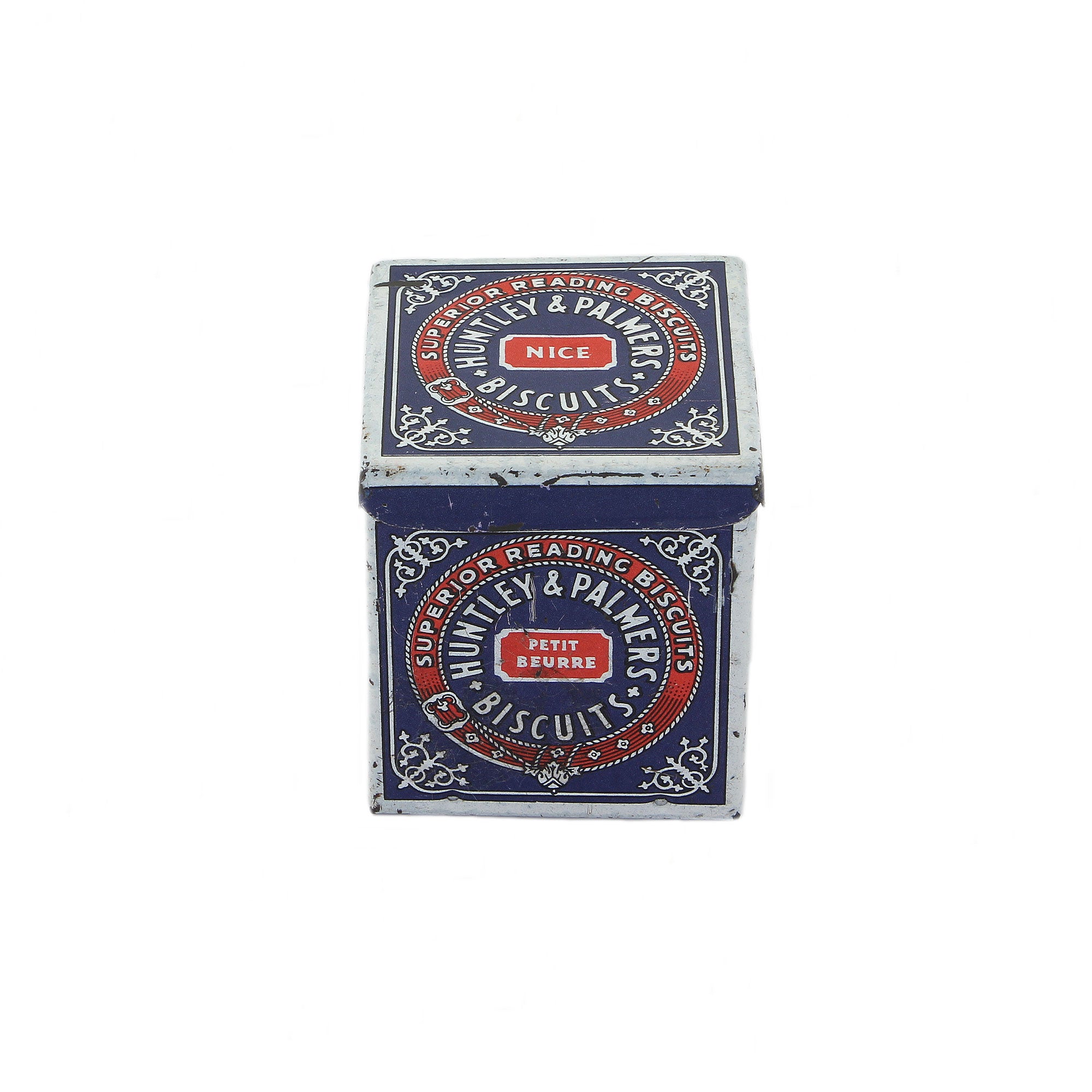 A vintage miniature Huntley & Palmers biscuit tin box with red, blue, and white detailing, featuring the brand's logo.