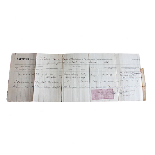 An antique document certificate with visible aging and fold marks, featuring a stamped seal.