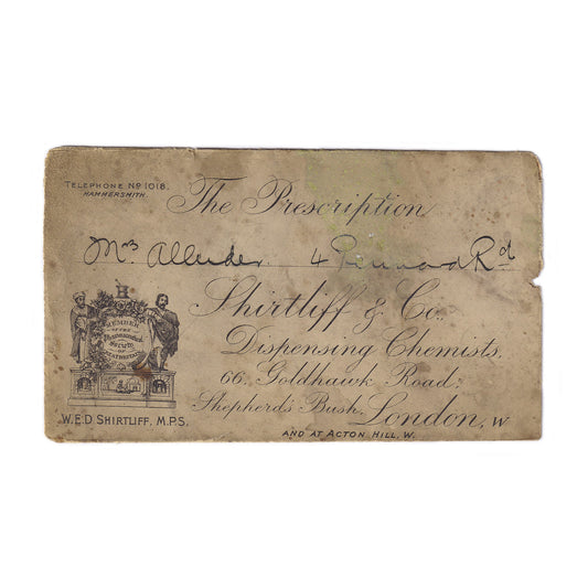 Antique prescription and envelope with a telephone number and date 22/6/08 written on it, displaying signs of wear and creases.