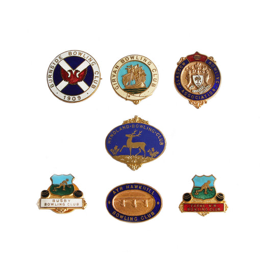 A set of 7 bowling club badges with enamel detailing 