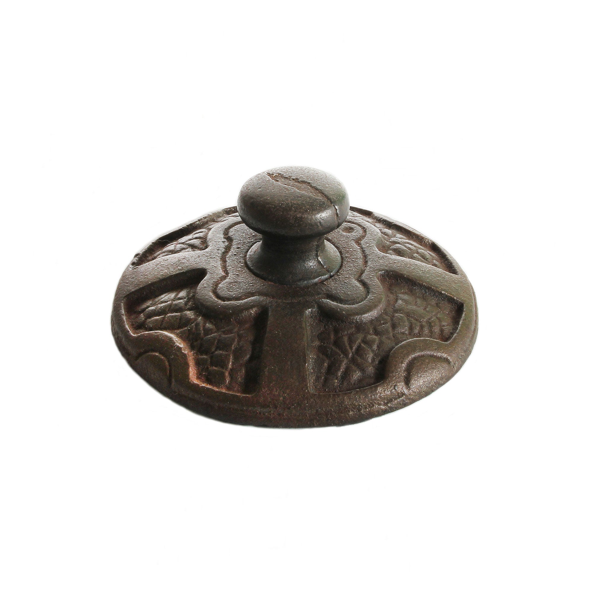An old cast iron detailed heavy paperweight with green felt underneath and the letters 'SO' on the top edge.