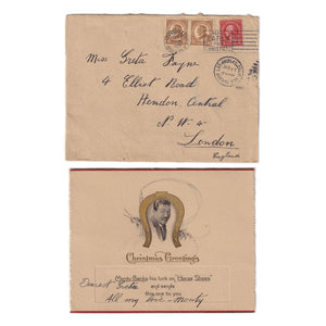 A vintage Christmas greetings card with an envelope, featuring a photograph of a man and a horse shoe graphic, postmarked in 1917.