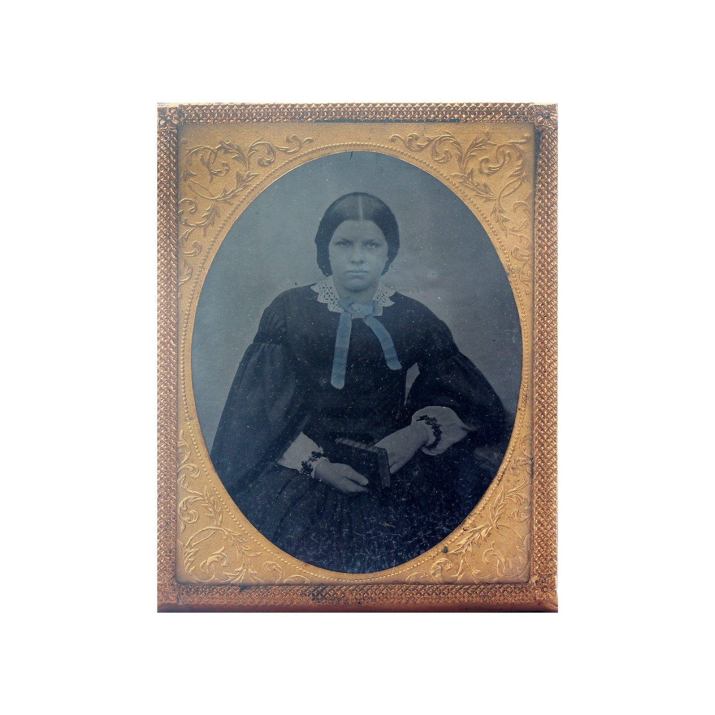 A beautiful antique ambrotype portrait of a young lady circa late 1800s