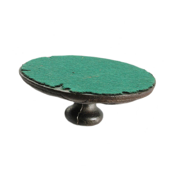 paperweight showing green felt underneath