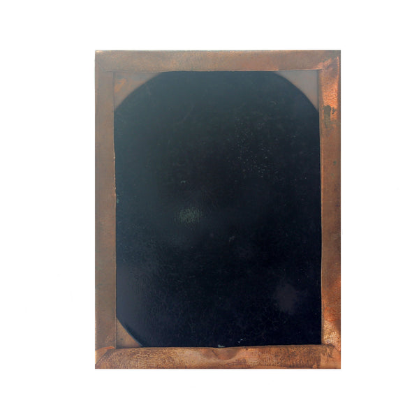back of antique portrait showing copper border edge