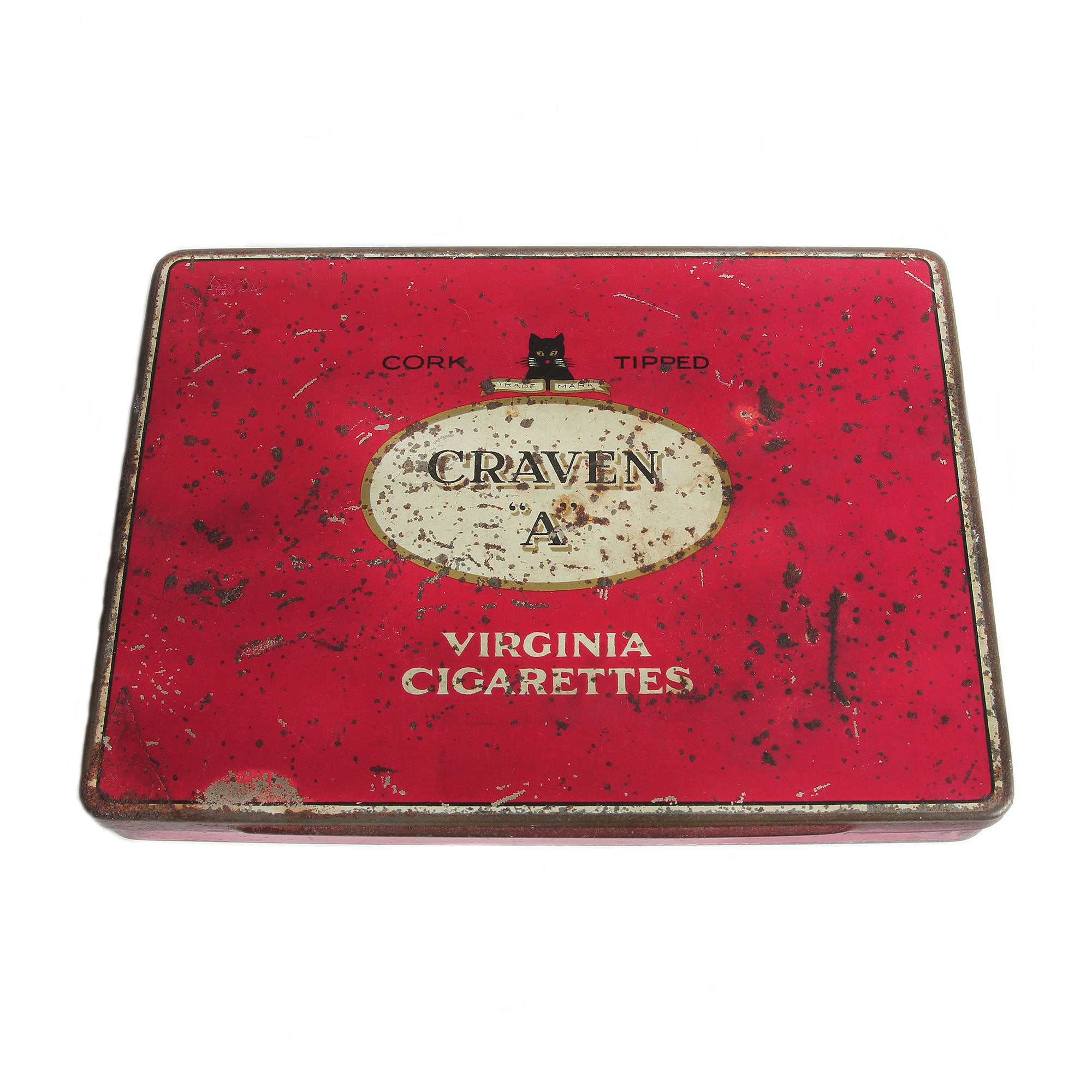 A vintage red Craven A Virginia cigarette tin with branding and text, showing signs of wear and use.