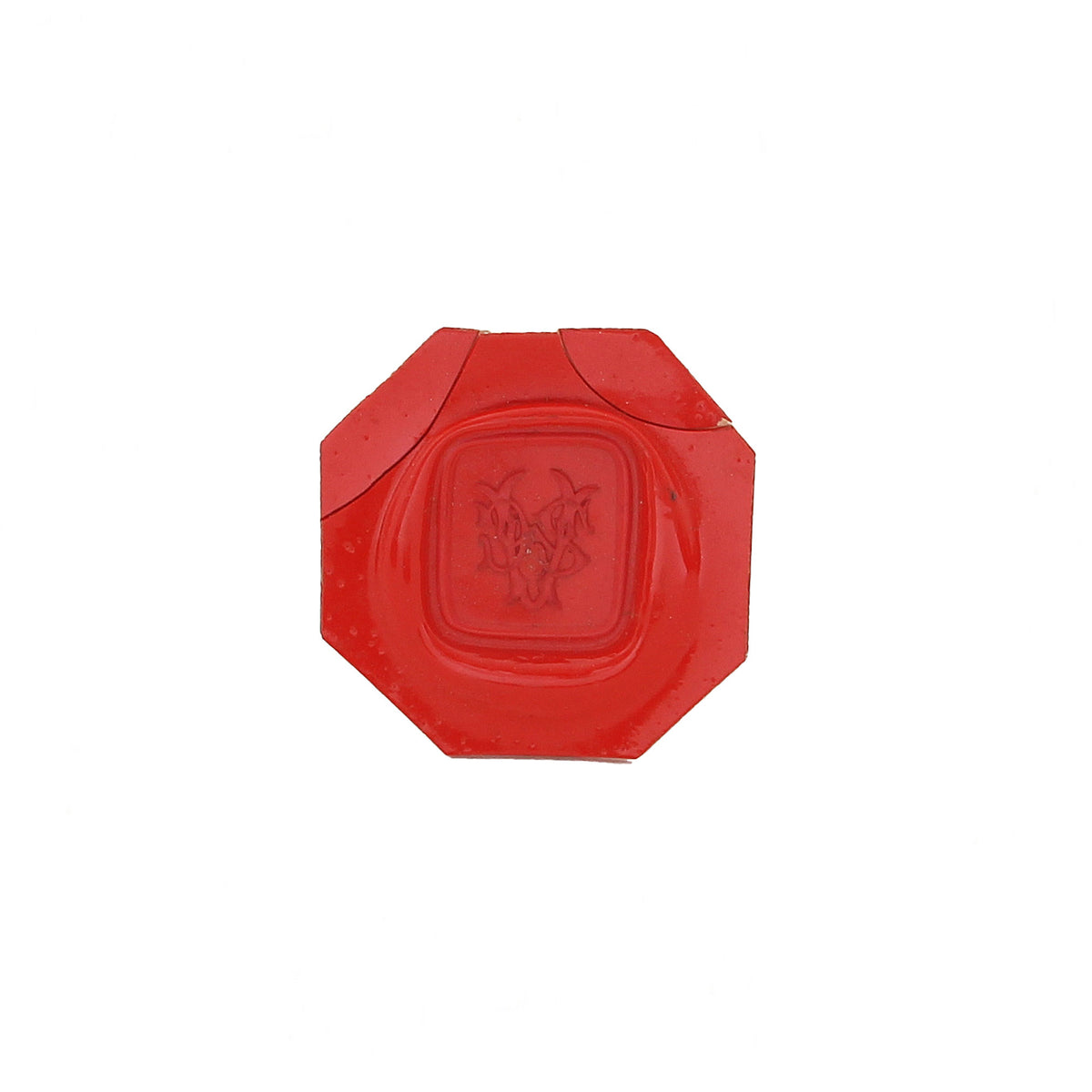 antique red hexagonal seal with two cracks