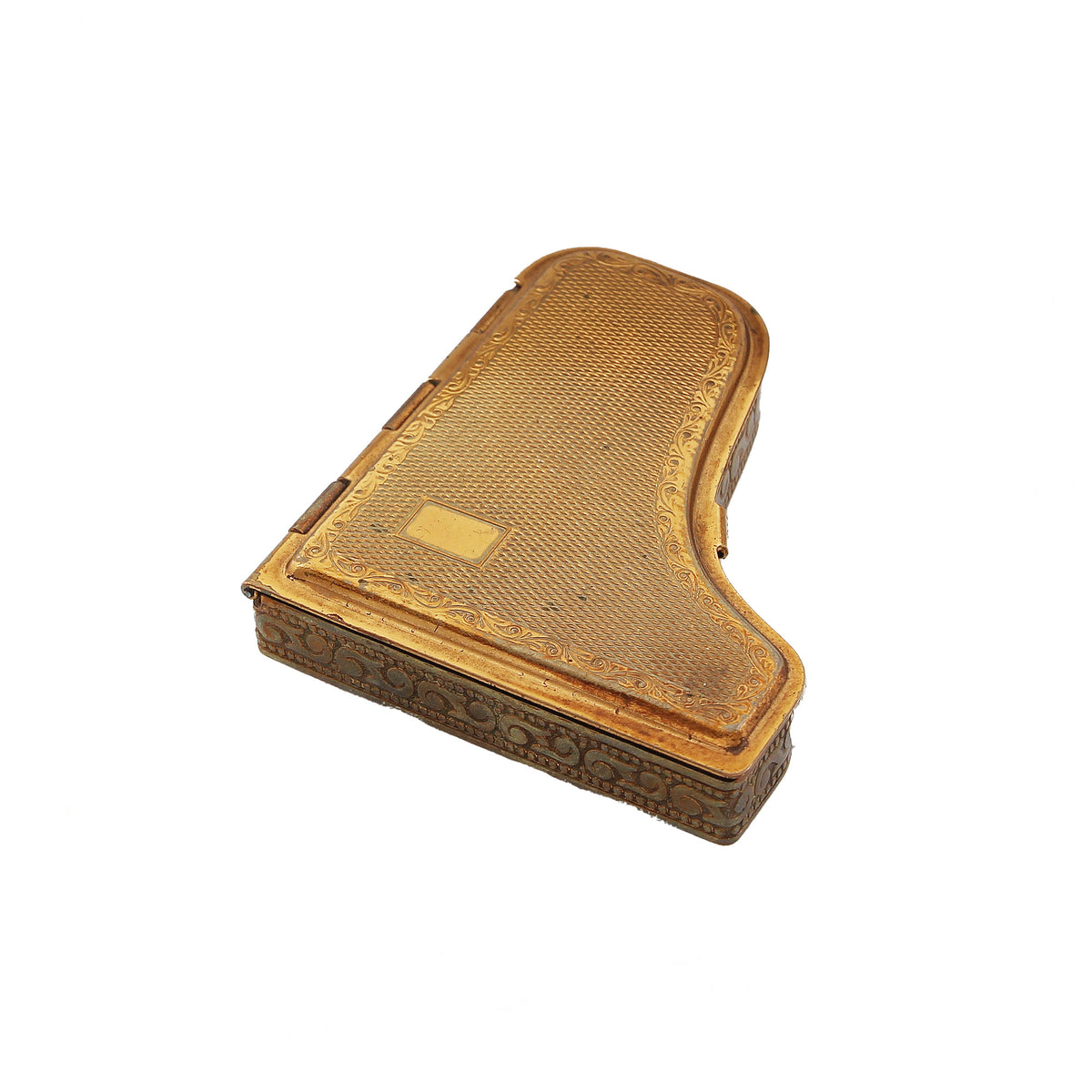 A grand piano powder compact top closed up
